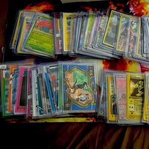 Here a Lot of Pokémon,Basketball,Baseball,football, Most of these are autograph.